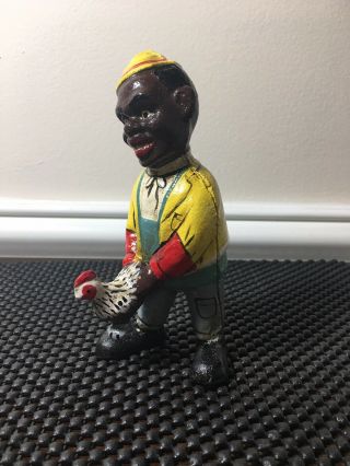 Cast Iron Child Man With Chicken Coin Money Dime Bank