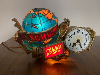 Schlitz Rotating Globe Register Clock
