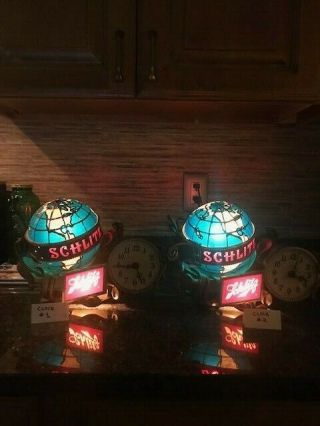 Two Schlitz Beer Globe Lighted Motion Sign Clock See Descriptions