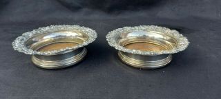 A Matching Victorian Silver Plated Wine Bottle Coasters.  embossed.  1800.  s. 2