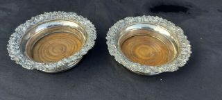 A Matching Victorian Silver Plated Wine Bottle Coasters.  embossed.  1800.  s. 3