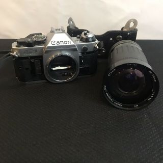 Vintage Canon Ae - 1 Slr 35mm Film Camera - Black.