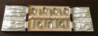 A Set Of Seven Vintage Silver Plated Teaspoons In An Interesting Box