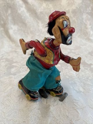 Vintage T.  P.  S.  Japan Clown On Roller Skate Tin Lithographed Mechanical Toy