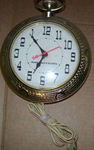 Vintage Spartus Backward Clock 