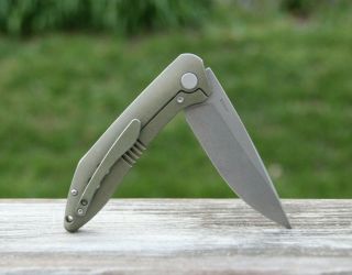 Titanium Frame Lock Folding Knife.  Bear Claw Brand.  3.  75 " S35vn Blade.