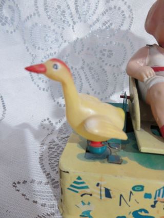 Alps Japan Tin Wind up Toy Happy Life Girl in Rocker Spinning Umbrella Goose 2