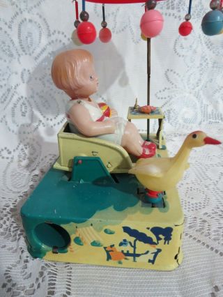 Alps Japan Tin Wind up Toy Happy Life Girl in Rocker Spinning Umbrella Goose 6