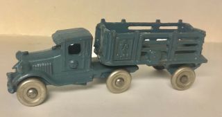 A.  C.  Williams 1930’s Cast Iron Truck And Stake Trailer,