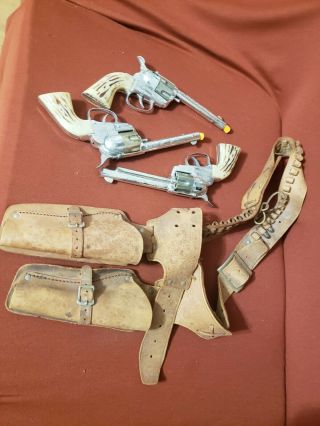 3 Mattel Fanner - 50 - Bullet Loading Cap Guns With 2 Holsters And 3 Bullets