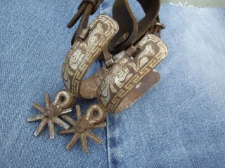 Vintage silver inlaid Mexican spurs with straps. 2