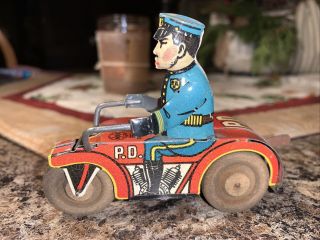 Vintage Marx Wind Up Tin Toy Police Motorcycle.  Wooden Wheels No Key.