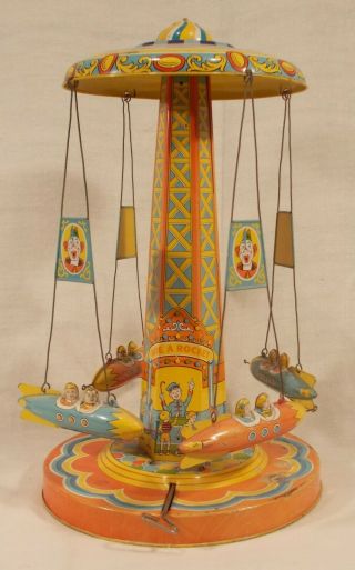 Vintage 1950’s Chein Tin Windup Toy 260 Ride - A - Rocket Amusement Park Ride