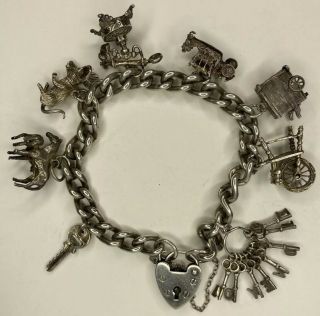Vintage 1976 Silver Charm Bracelet Chain With 8 Charms.  Pony Foal Mouse Carriage