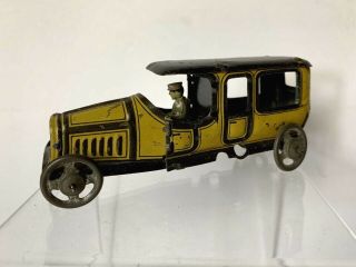 Vintage German Tin Penny Toy Automobile With Driver