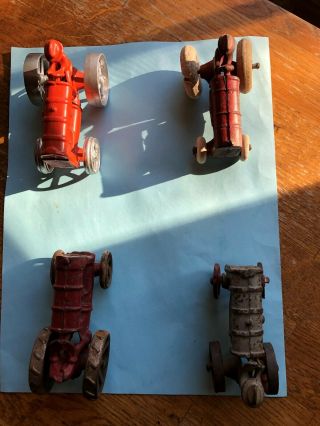 4 Cast Iron Toy Tractors 1 = Arcade 2 = Hubley In Good To