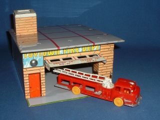 Vintage 1950’s Wyandotte Tin Toytown Fire Dept.  Building And Plastic Fire Engine