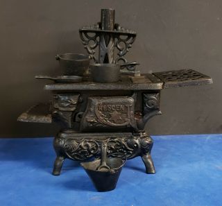 Vintage Crescent Cast Iron Mini Toy Stove With Accessories.  Made In The Usa.