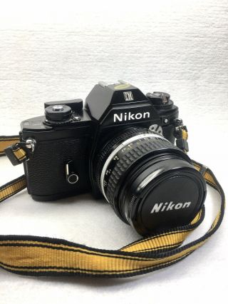 Vintage Nikon Em 35mm Film Camera W/ 50mm F/1.  8 Lens