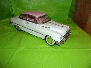 1950 Buick White & Pink Two Door Tin Friction Drive Toy Car