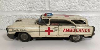 Vintage Tin Friction Nakamura Oldsmobile 88 Station Wagon Ambulance Japan