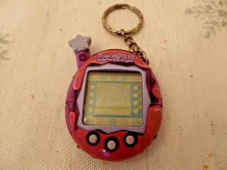 Vintage Tamagotchi Connection V4.  5 Purple & Pink With Gray Star