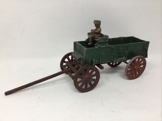 Mccormick Deering Cast Iron Farm Wagon Toy Arcade Mfg.  Co.  Freeport Il.  Rider