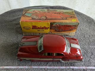 Antique Minister Deluxe Red Tin Friction Car In -