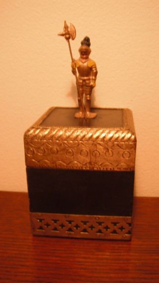 Decorated Trinket Box Withstanding Shining Knight In Armor On Top