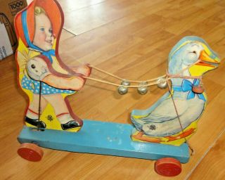 Vintage Gong Manufacturing Baby Sandy Pull Toy