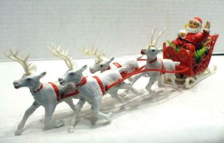 Vintage Plastic Santa In Sleigh With 4 Reindeer 13 1/4 " Long