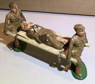 Vintage Barclay? Manoil? Lead Wounded Soldier On Stretcher In Sling Toy Figure