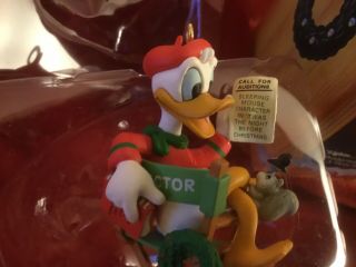 Donald Duck,  Enesco 1992,  3 &4 Christmas Ornament “lights.  Camera.  Christmas”used