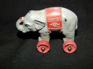 Antique Celluiod Jumbo Toy Circus Elephant On Wheels 100.