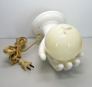 1970s Glazed White Ceramic Hand Holding A Glass Globe Sconce Wall Light