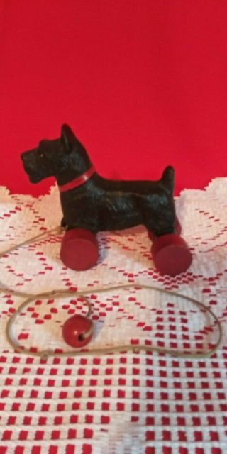 Antique Composition Scottie Dog On Wooden Wheels Pull Toy