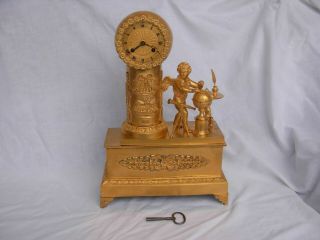 Antiques French Gilt Bronze Clock,  Restoration Period,  Early 19th Century.