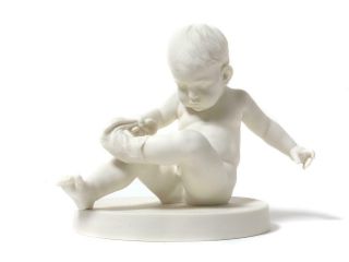 Biscuit Porcelain Figurine (parian) " Boy With Sock​​ ".  Sweden,  Gustavsberg.