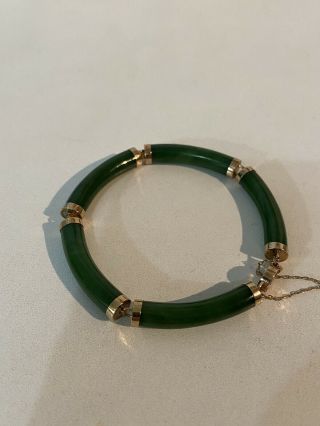 Vintage Chinese Bracelet Made Of Natural Green Jade And 14 Karat Yellow Gold.