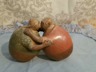 Handcrafted In Peru Wooden Rolly Poly Man And Woman Kissing Statue
