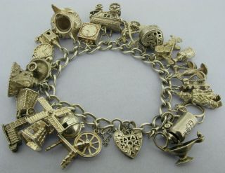 Heavy Vintage Solid Sterling Silver Charm Bracelet With 23 Charms 110 Gram 1972