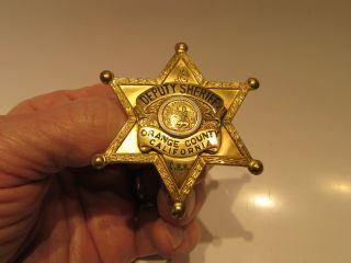 OBSOLETE 1950 DEPUTY SHERIFF BADGE - ORANGE COUNTY CALIFORNIA - 6 POINT 3