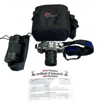 Canon Ae - 1 Slr 35mm Film Camera Plus A Vivitar 67mm Lens Vintage