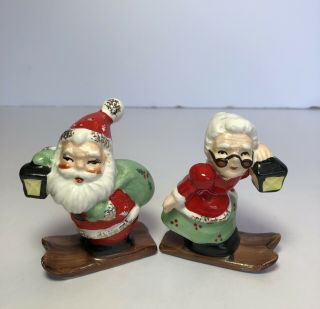 Vintage Santa And Mrs.  Claus On Skis Salt & Pepper Shakers