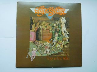 Areosmith 1975 " Toys In The Attic " Vinyl Long Playing Record Pc 33479