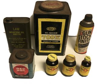 2 Vintage Smokeless Powder Tins & 3 Bottles Of Powder Solvent & 1 Weapons Oil.