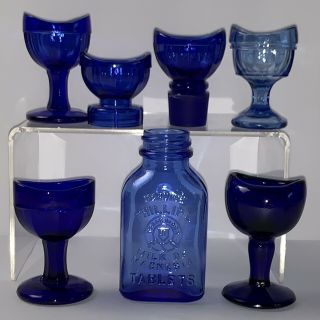 7 Vintage Cobalt Blue Glass Wyeth,  John Bull Eye Cups,  Phillips Milk Of Magnesia