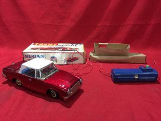 Vintage Tin Toy Car Sedan With Remote Control Battery Operated Collectible