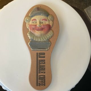 Vintage Toy Noisemaker Old Reliable Coffee Clown Embossed Paddle