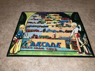 Arcade Cast Iron Toys Embossed Tin Display Sign